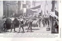 Unweildy procession through Constantinople's mean
streets eight men to carry a barrel