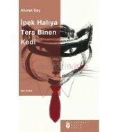 İpek Halıya Ters Binen Kedi