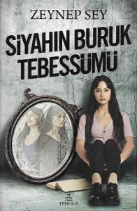 Siyahın Buruk Tebessümü - Ciltli Kitap Siyahın Buruk Tebessümü - Ciltli Kitap