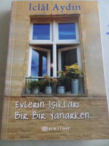 Evlerin Işıkları Bir Bir Yanarken