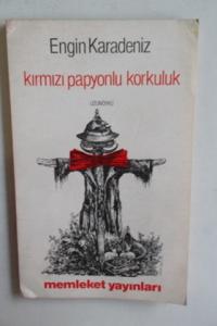 Kırmızı Papyonlu Korkuluk