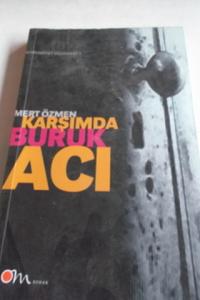 Karşımda Buruk Acı