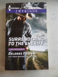 Surrendering To The Sheriff Delores Fossen