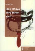 İpek Halıya Ters Binen Kedi